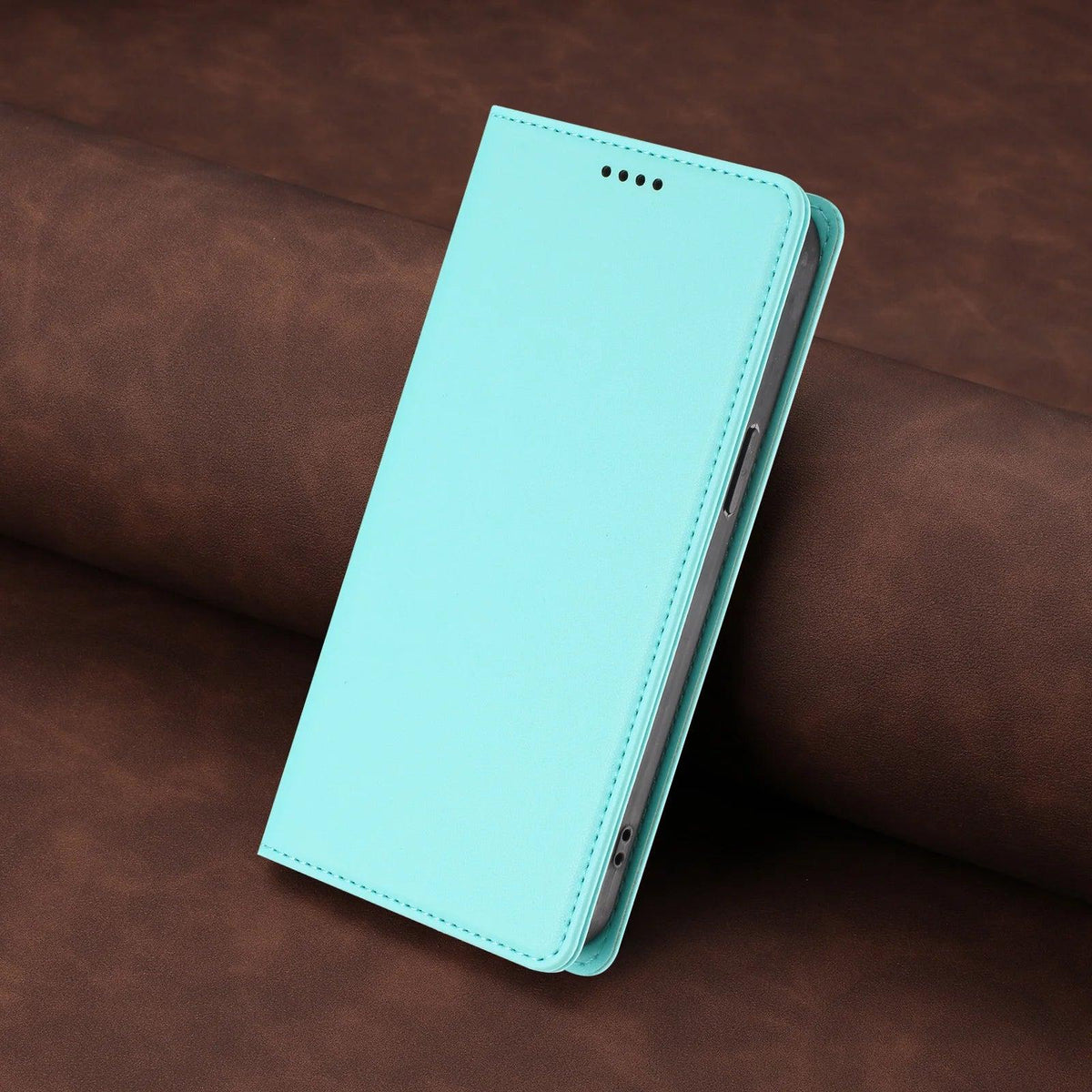 Mint green stitched PU leather magnetic flip wallet case for Samsung Galaxy S26 and S25 series, angled closed view