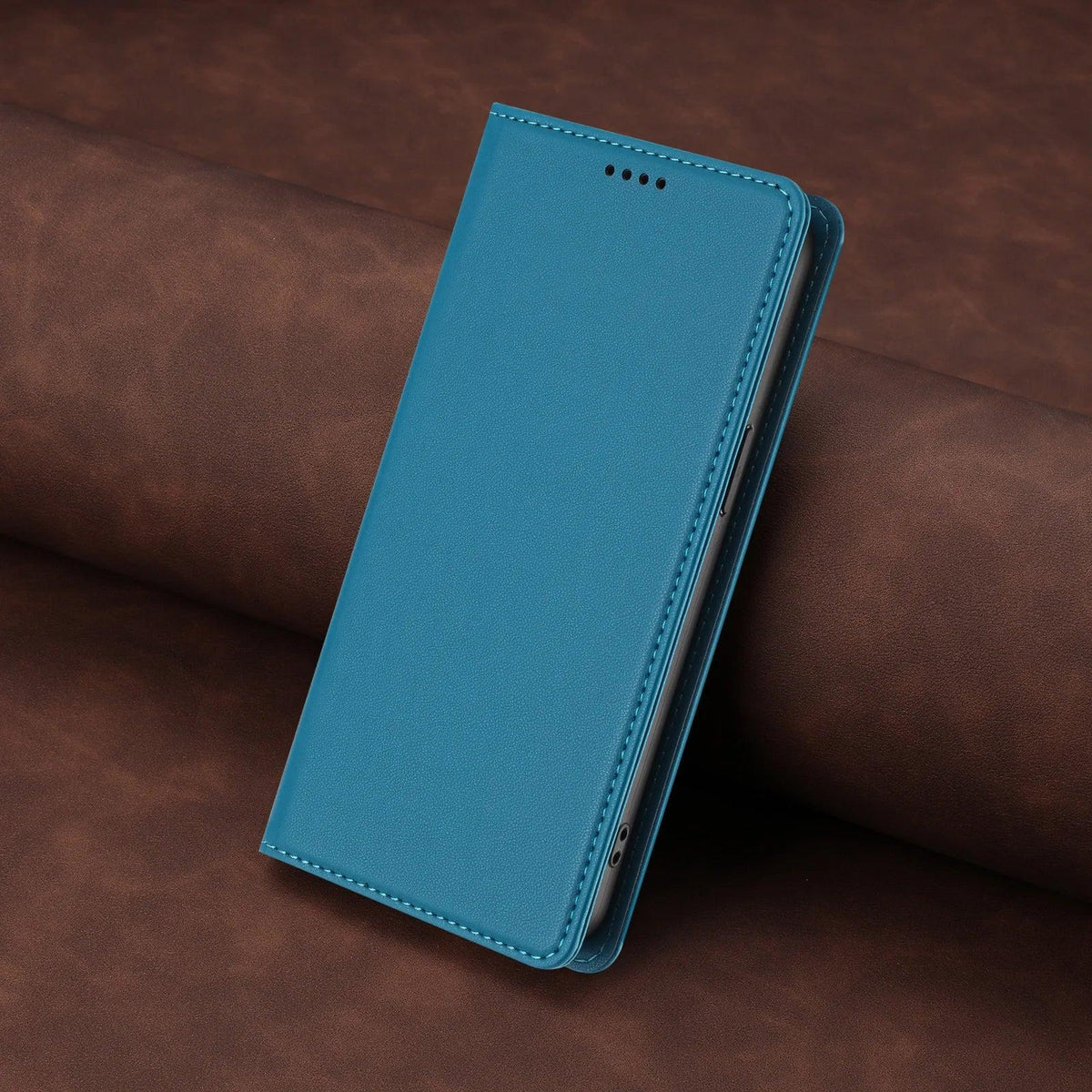Lake blue stitched PU leather magnetic flip wallet case for Samsung Galaxy S26 and S25 series, angled closed view