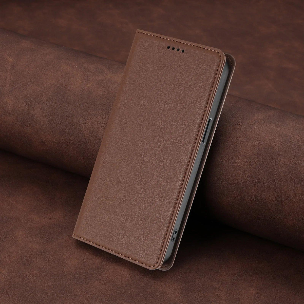 Brown stitched PU leather magnetic flip wallet case for Samsung Galaxy S26 and S25 series, angled closed view