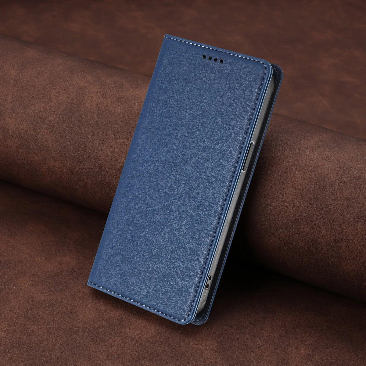 Dark blue stitched PU leather magnetic flip wallet case for Samsung Galaxy S26 and S25 series, angled closed view