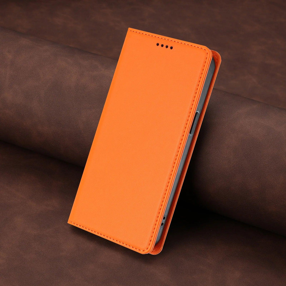 Orange stitched PU leather magnetic flip wallet case for Samsung Galaxy S26 and S25 series, angled closed view