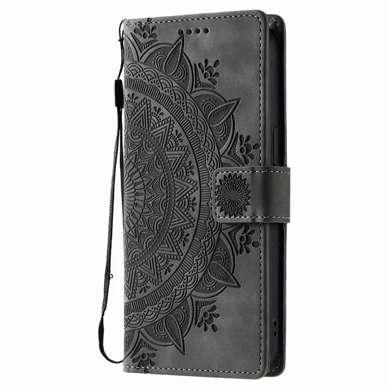 Grey mandala embossed Galaxy wallet case with wrist strap, closed front view