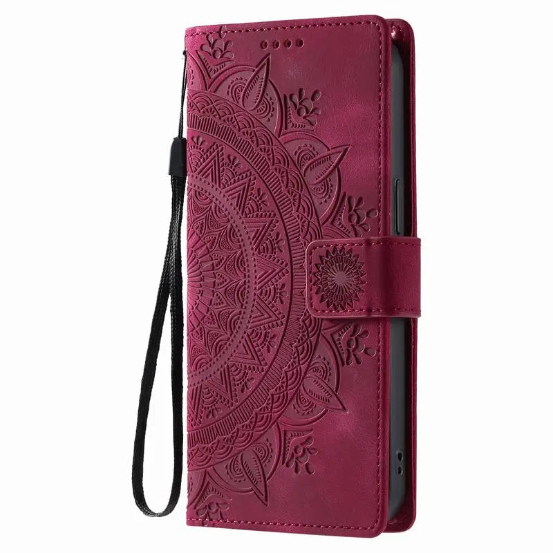 Wine red mandala embossed Galaxy wallet case with wrist strap, closed front view