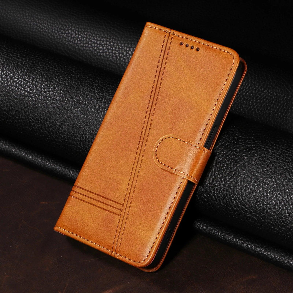 Brown stitched magnetic wallet case for Google Pixel, closed front view