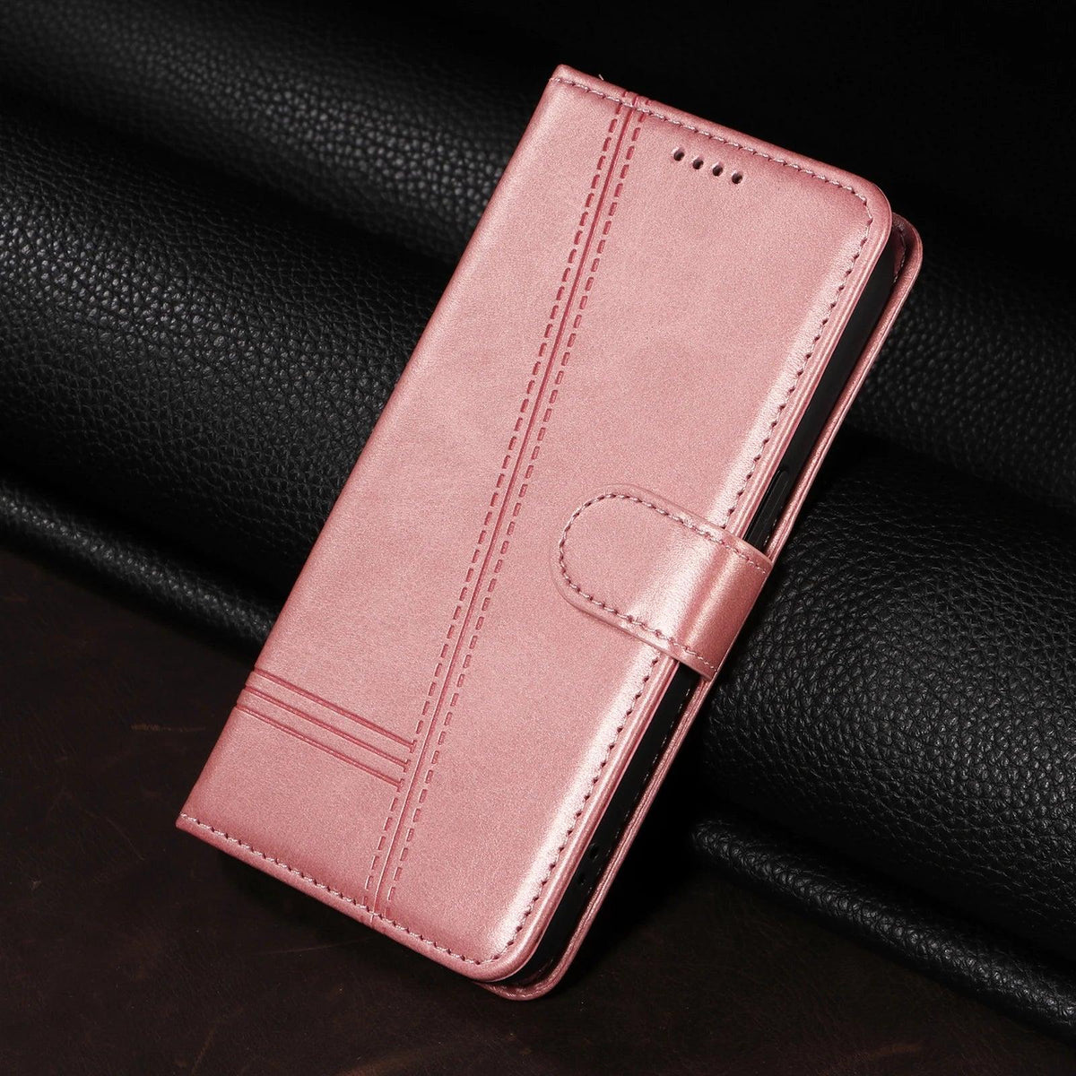Pink stitched magnetic wallet case for Google Pixel, closed front view