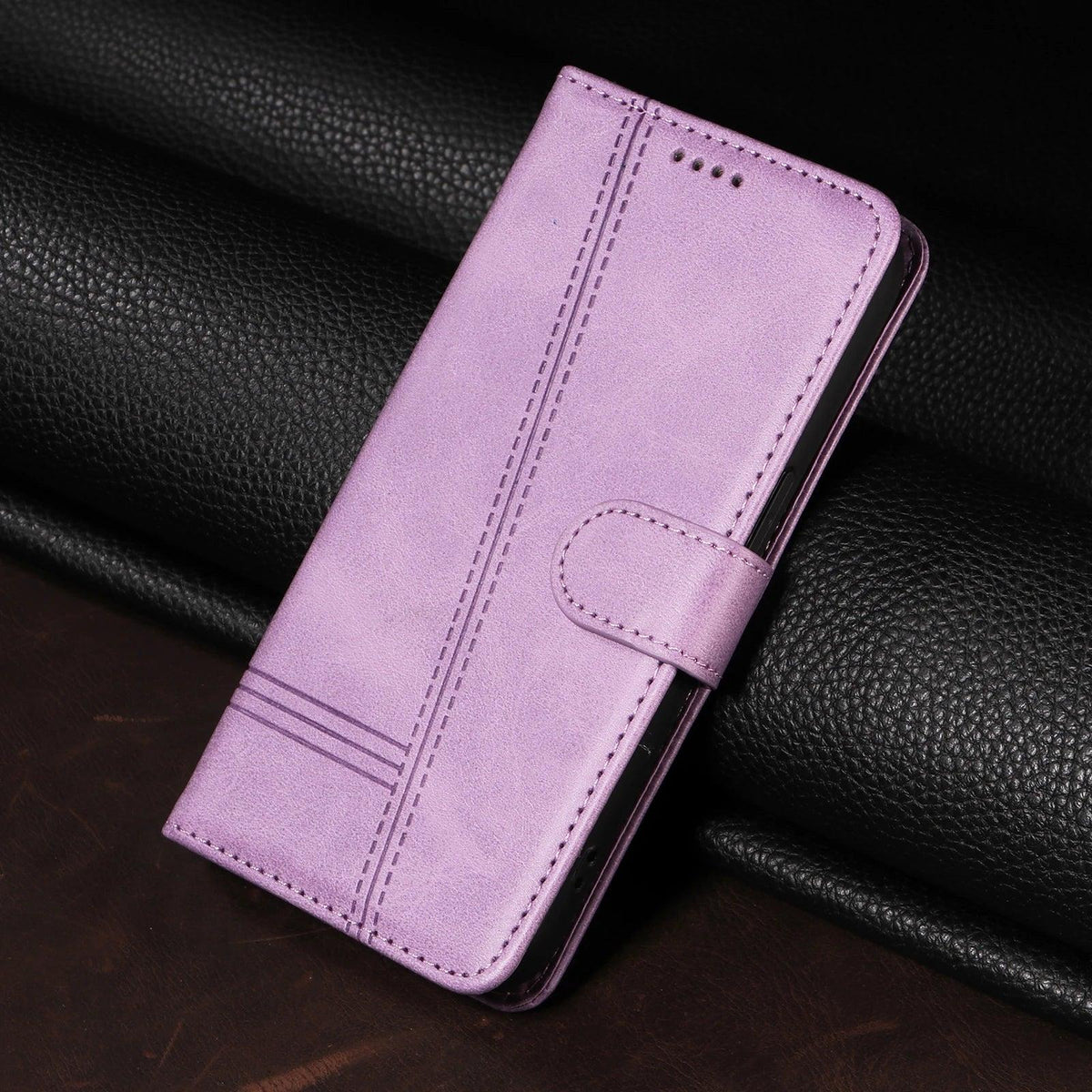 Purple stitched magnetic wallet case for Google Pixel, closed front view
